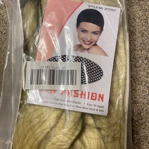 Long blonde wig. Never worn.